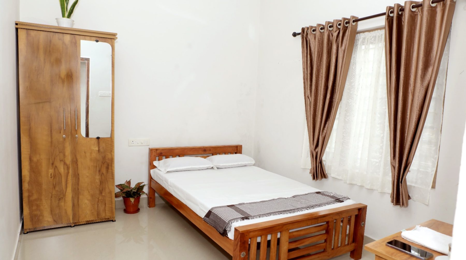 The Riverside Bliss Stays homestay on the Manimala River in Yendayar, Kottayam — a family-friendly Kerala Tourism–certified property